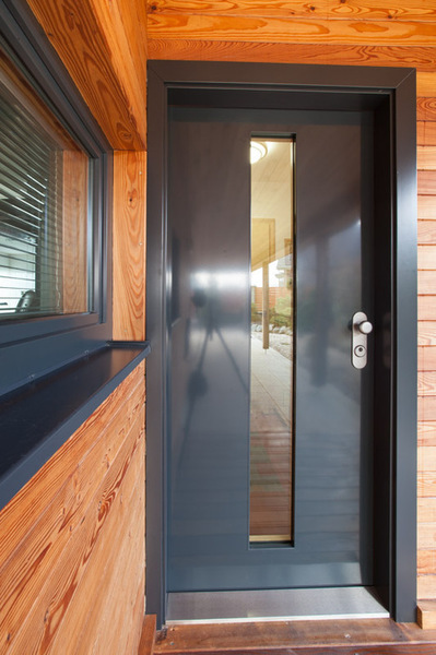 glazed security door perfectly matched with the windows